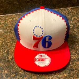 76er’s vintage new era SnapBack. One size fits all.
